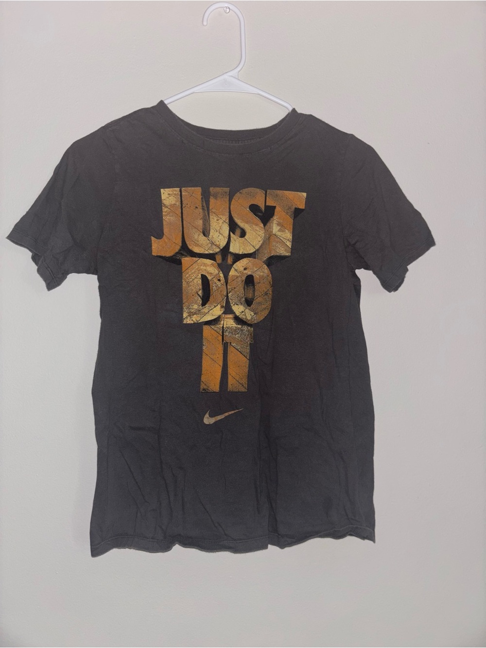 Nike Black Tee with Gold 'Just Do It' Vertical Graphic